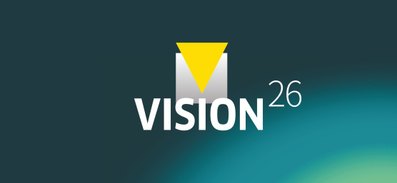 청록색 배경에 ‘VISION26’이라는 문구가 적힌 그래픽.